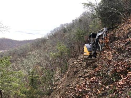 Excavator on Cliff